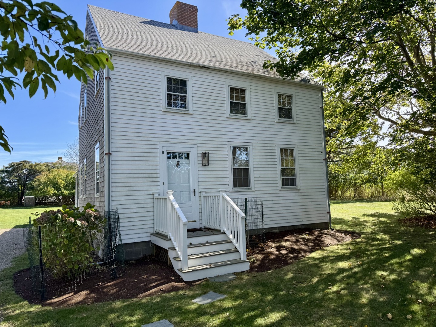 35 Sankaty Road Nantucket, MA 02554 - Photo 6 of 12 a view of a house with a yard