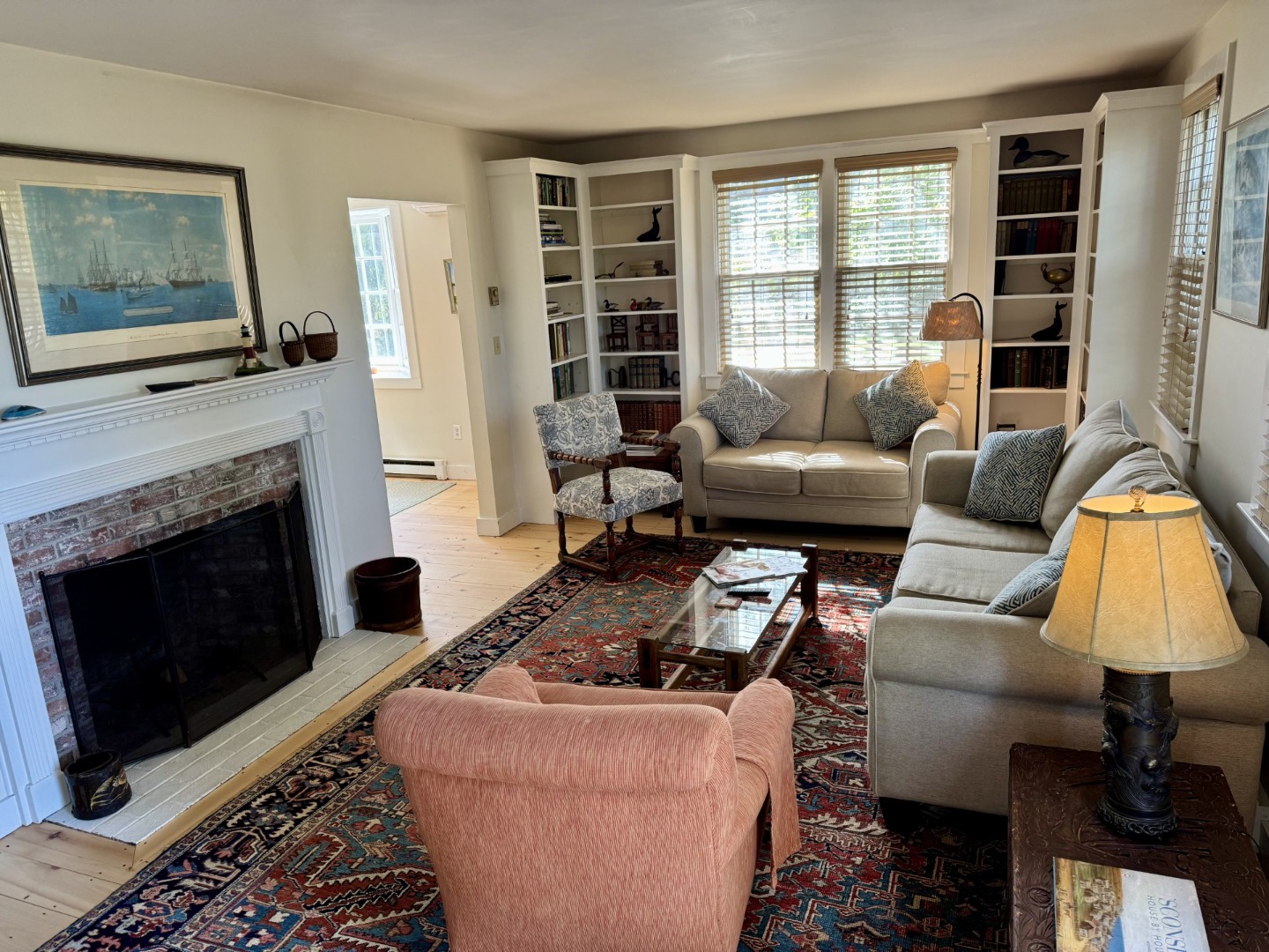 35 Sankaty Road Nantucket, MA 02554 - Photo 7 of 12 a living room with furniture and a fireplace