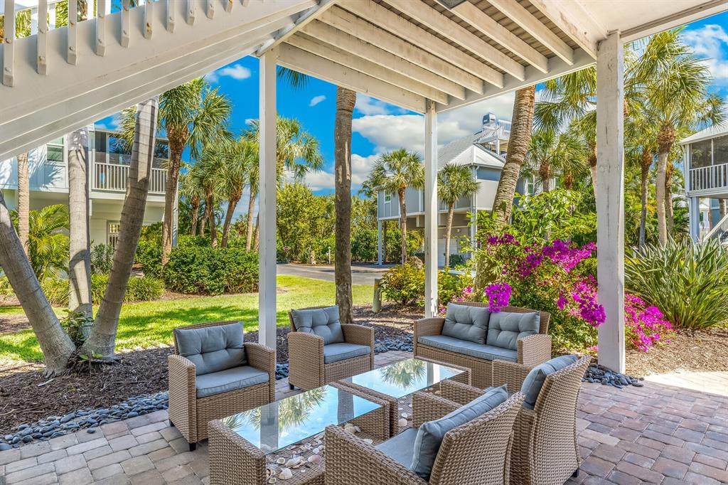 5000 Gasparilla Road, Unit 19 Boca Grande, FL 33921 - Photo 2 of 48 a building outdoor space with patio