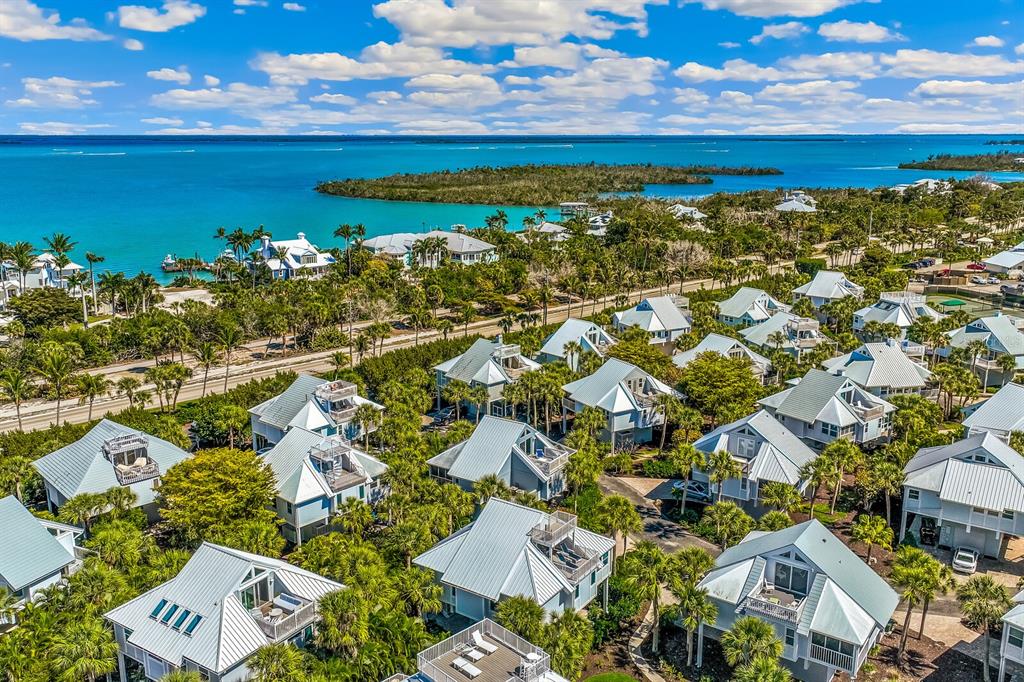 5000 Gasparilla Road, Unit 19 Boca Grande, FL 33921 - Photo 24 of 48 an aerial view of residential houses with outdoor space