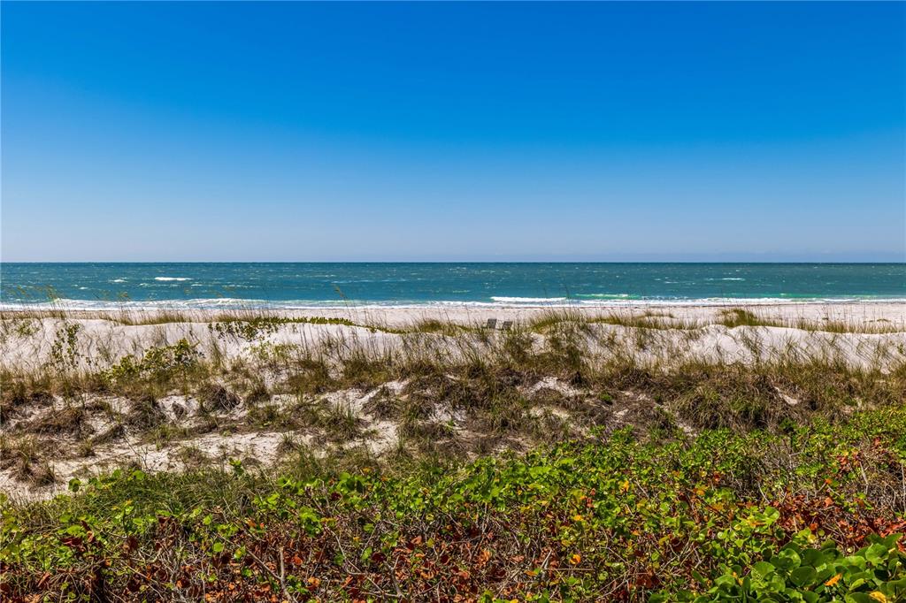 5000 Gasparilla Road, Unit 19 Boca Grande, FL 33921 - Photo 48 of 48 a view of beach and an ocean