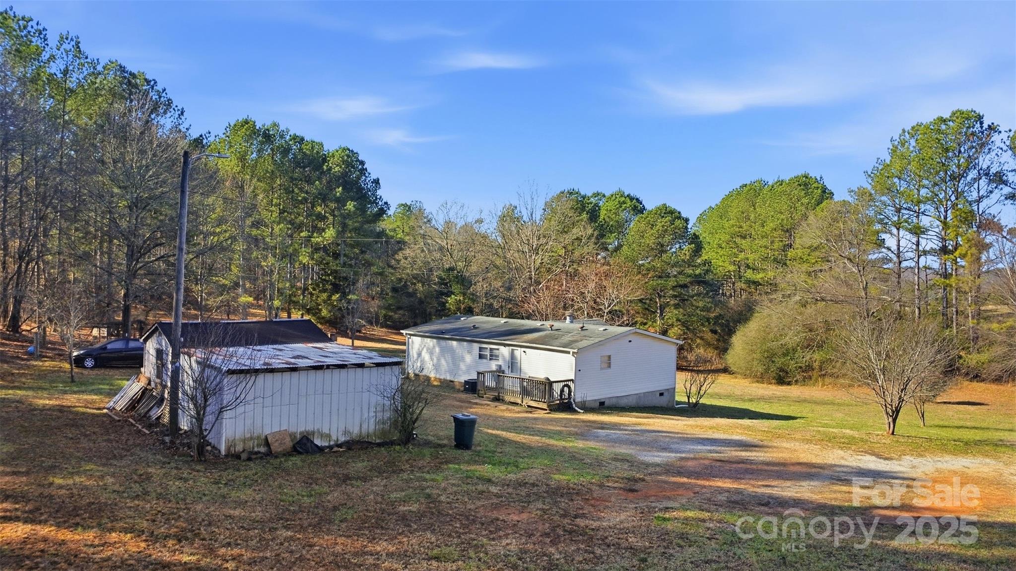 2338 Whelchel Road Mooresboro, NC 28114 - Photo 16 of 20 a view of a house with a yard