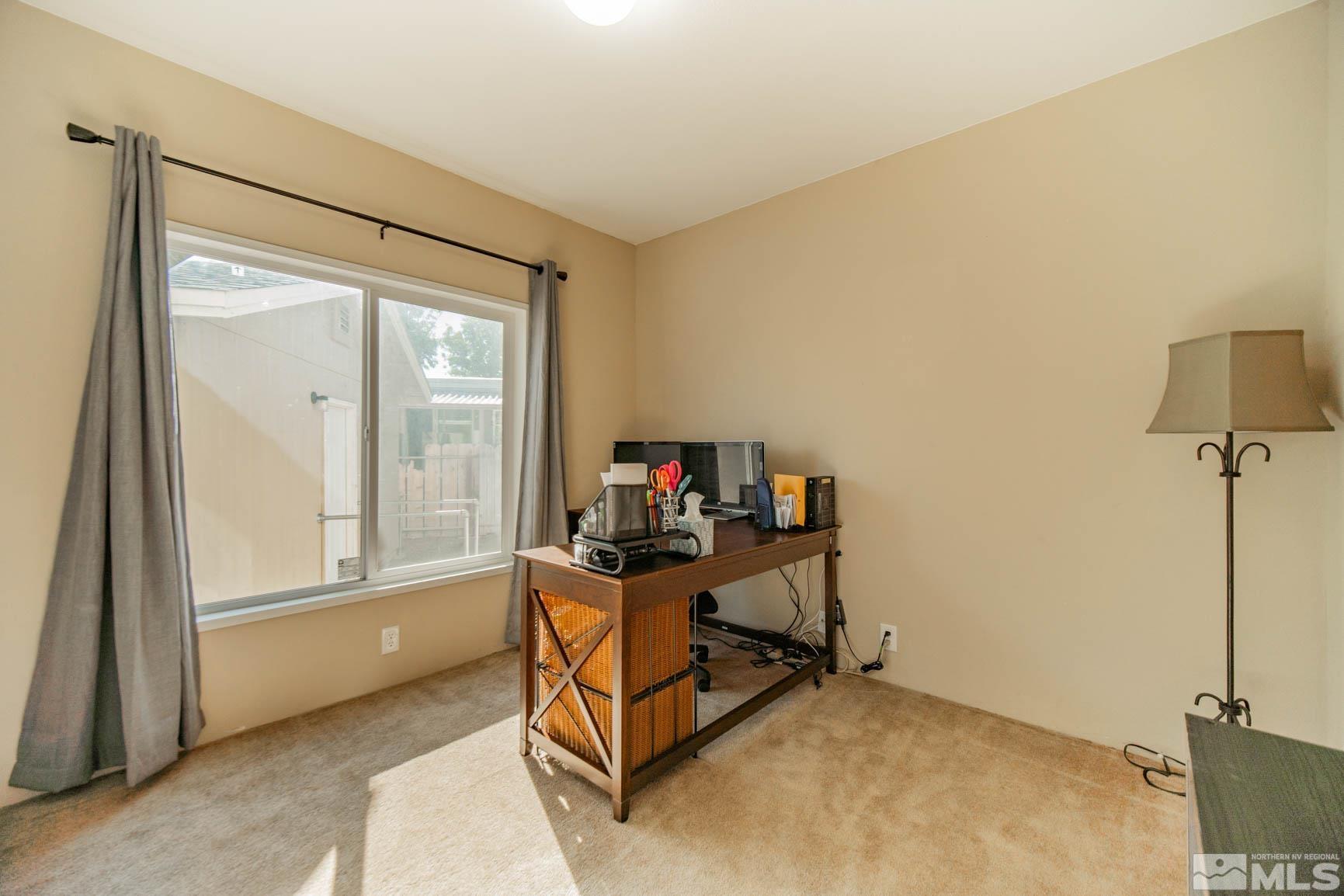 16210 Rhyolite Circle Reno, NV 89521 - Photo 18 of 39 a living room with furniture
