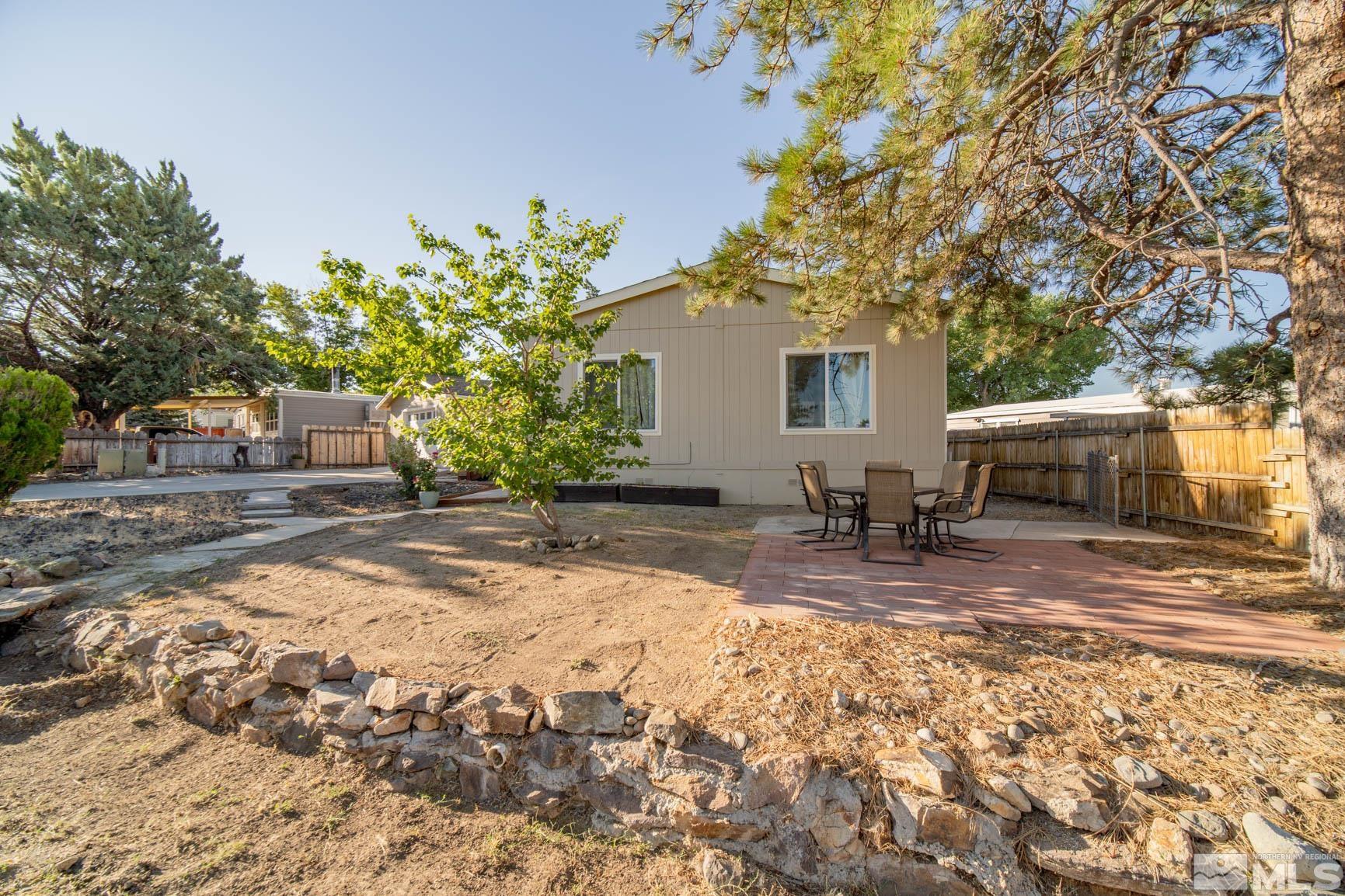 16210 Rhyolite Circle Reno, NV 89521 - Photo 26 of 39 a view of a backyard with sitting area