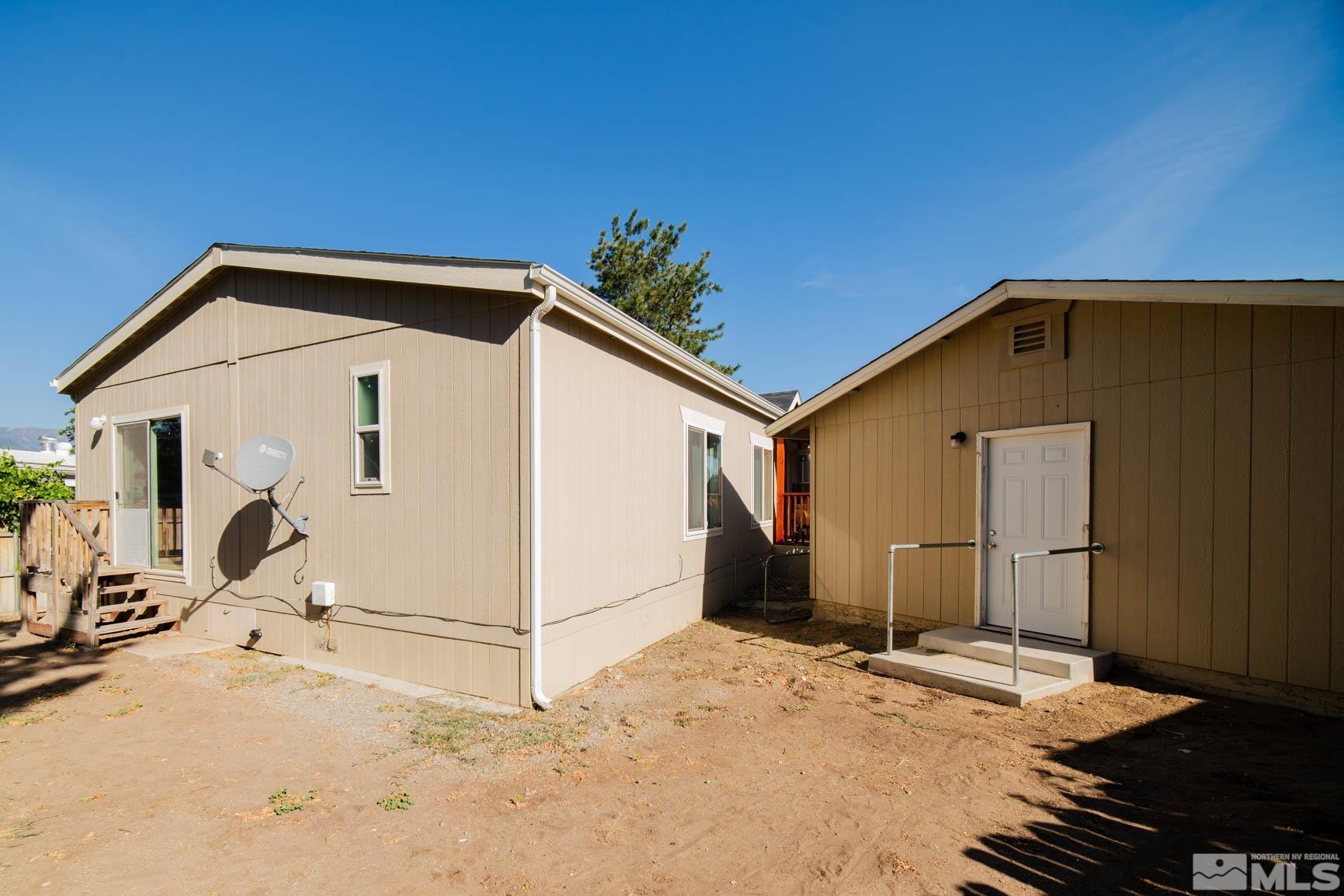 16210 Rhyolite Circle Reno, NV 89521 - Photo 28 of 39 a view of a house with a backyard