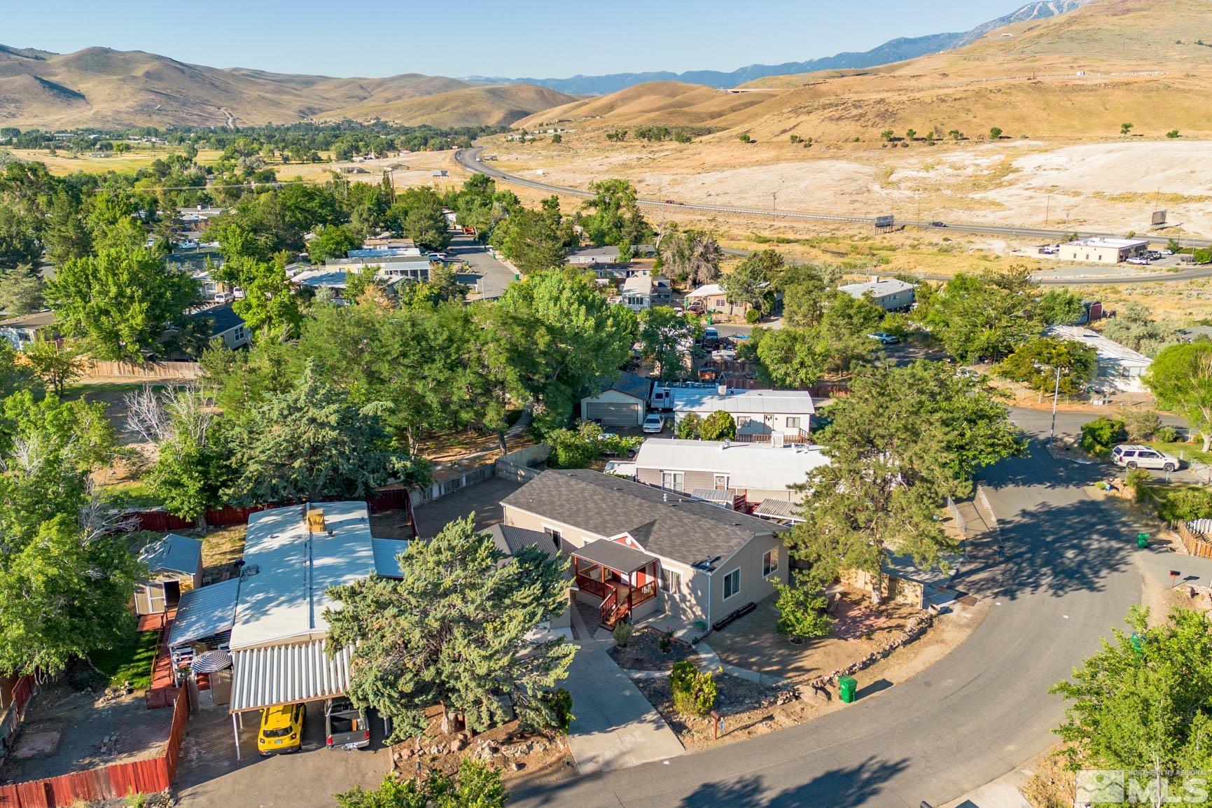 16210 Rhyolite Circle Reno, NV 89521 - Photo 32 of 39 an aerial view of a city with lots of residential buildings