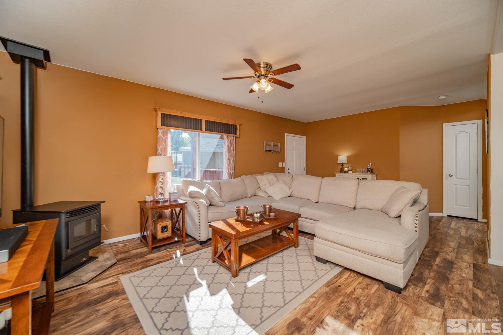 16210 Rhyolite Circle Reno, NV 89521 - Photo 5 of 39 a living room with furniture and a window
