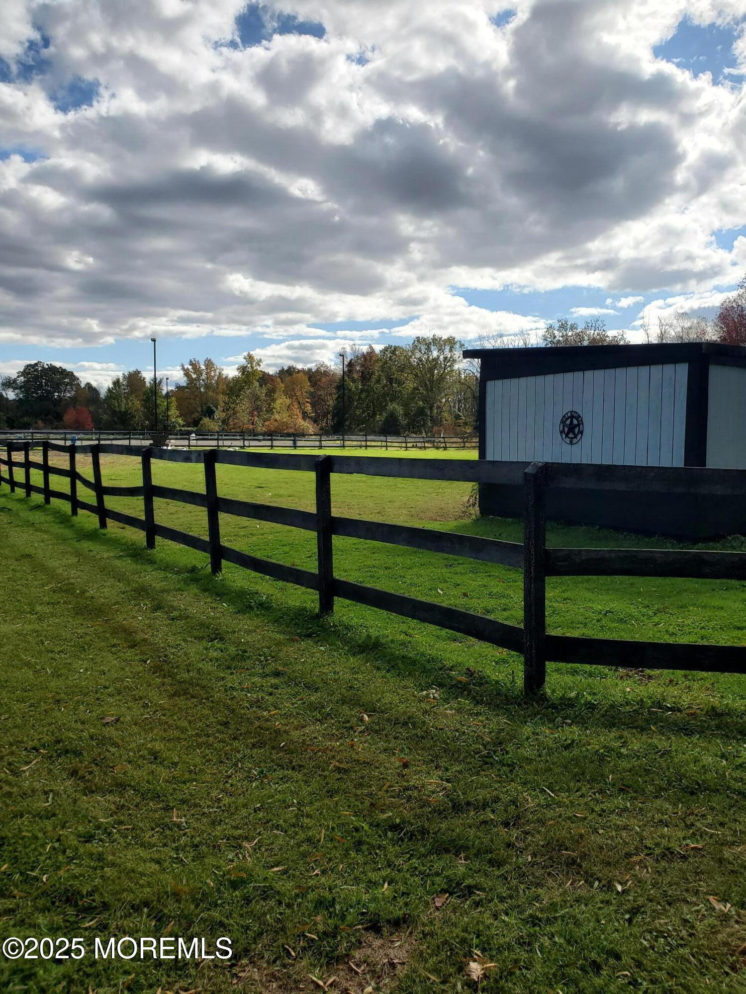 2328 Monmouth Road Jobstown, NJ 08041 - Photo 12 of 54 a view of a bench in a yard