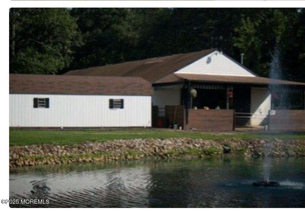 2328 Monmouth Road Jobstown, NJ 08041 - Photo 13 of 54 a front view of a house with garden