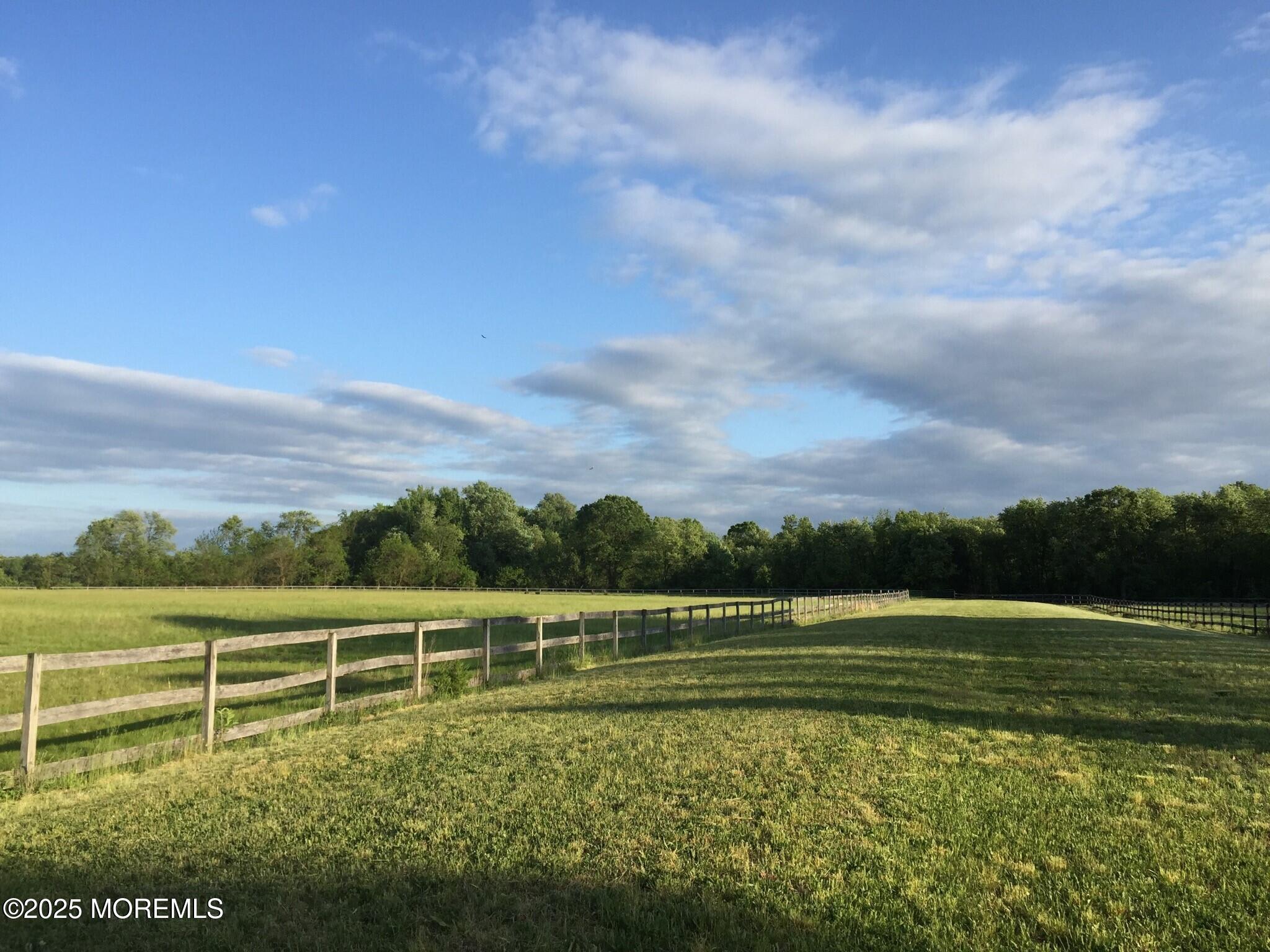2328 Monmouth Road Jobstown, NJ 08041 - Photo 28 of 54 a view of a golf course with a lake