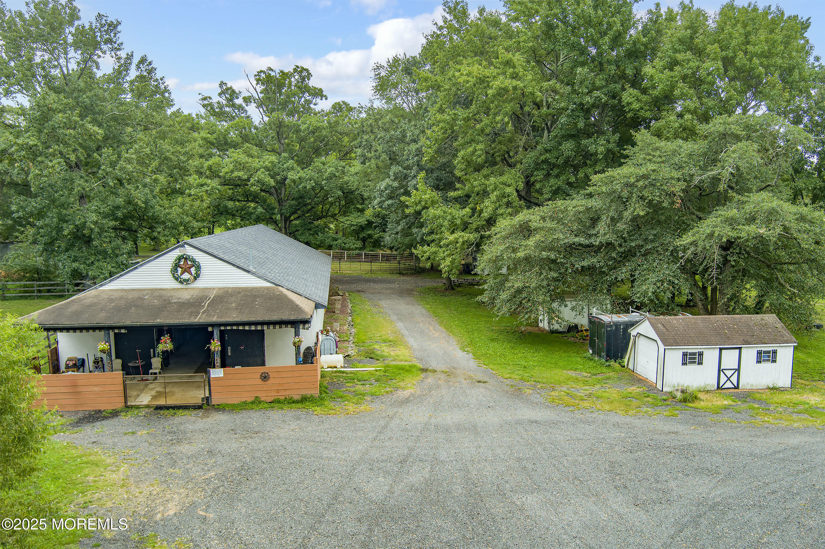 2328 Monmouth Road Jobstown, NJ 08041 - Photo 5 of 54 a front view of a house with garden