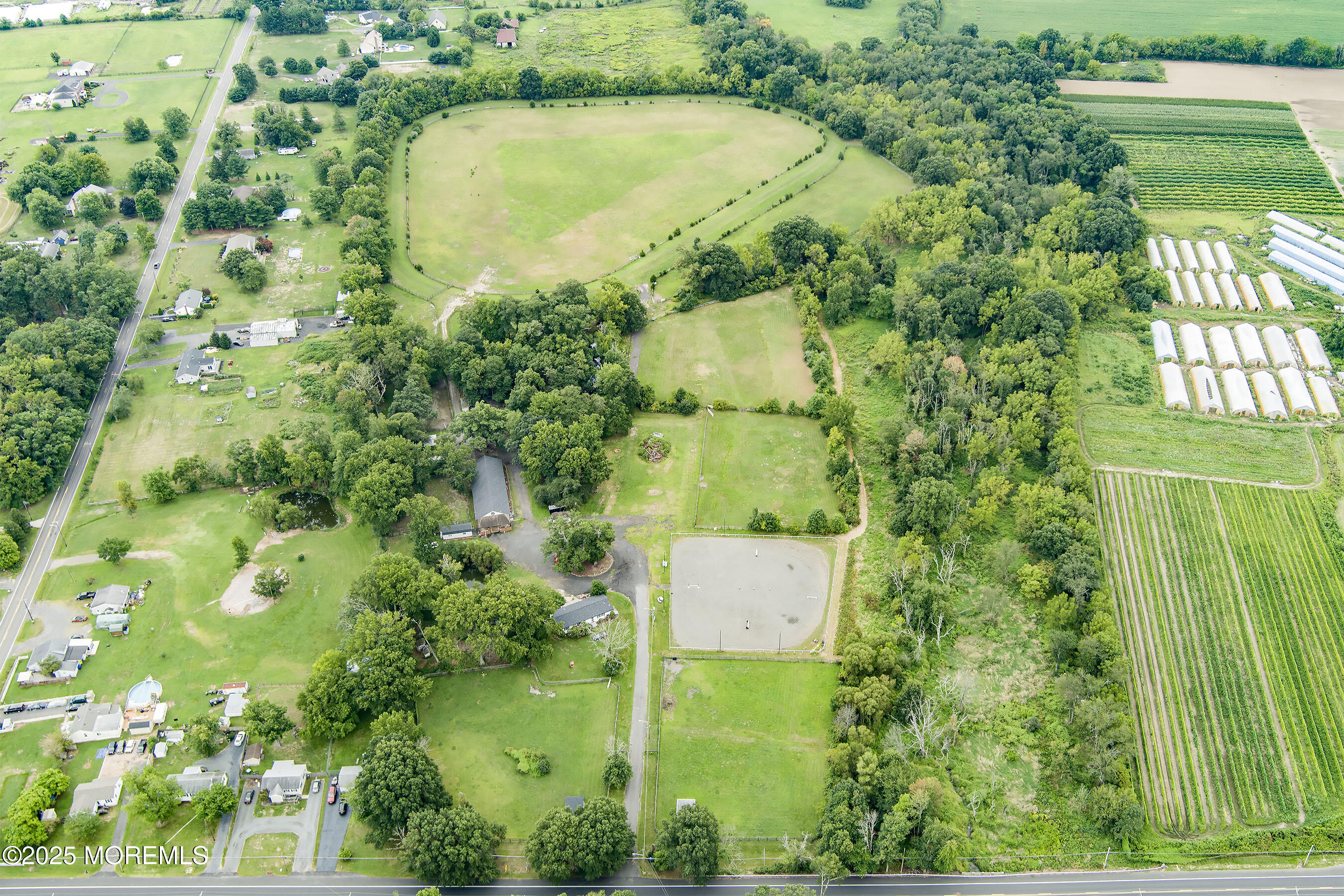 2328 Monmouth Road Jobstown, NJ 08041 - Photo 52 of 54 a view of a garden with a fountain