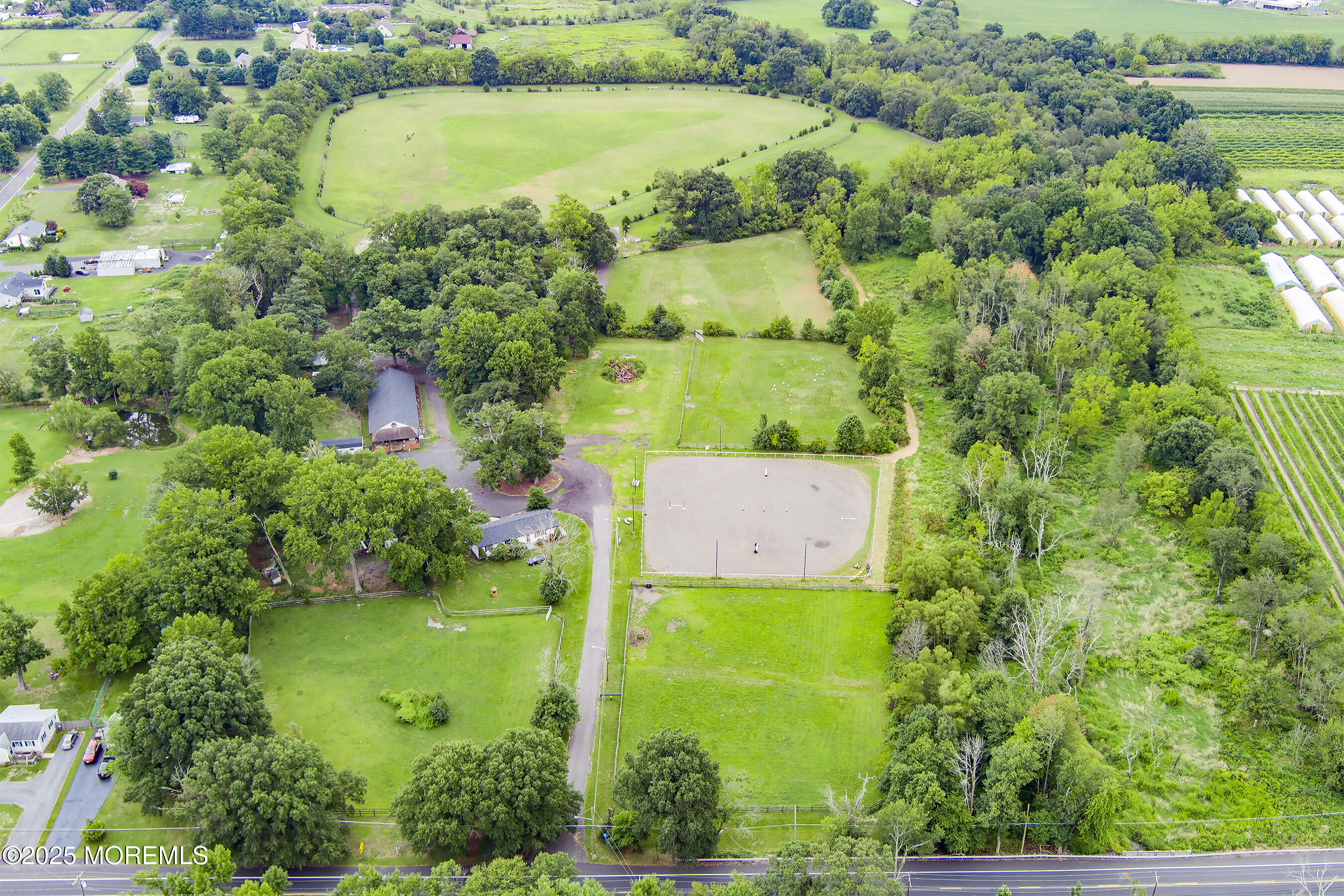 2328 Monmouth Road Jobstown, NJ 08041 - Photo 53 of 54 an aerial view of a houses with a yard and lake view