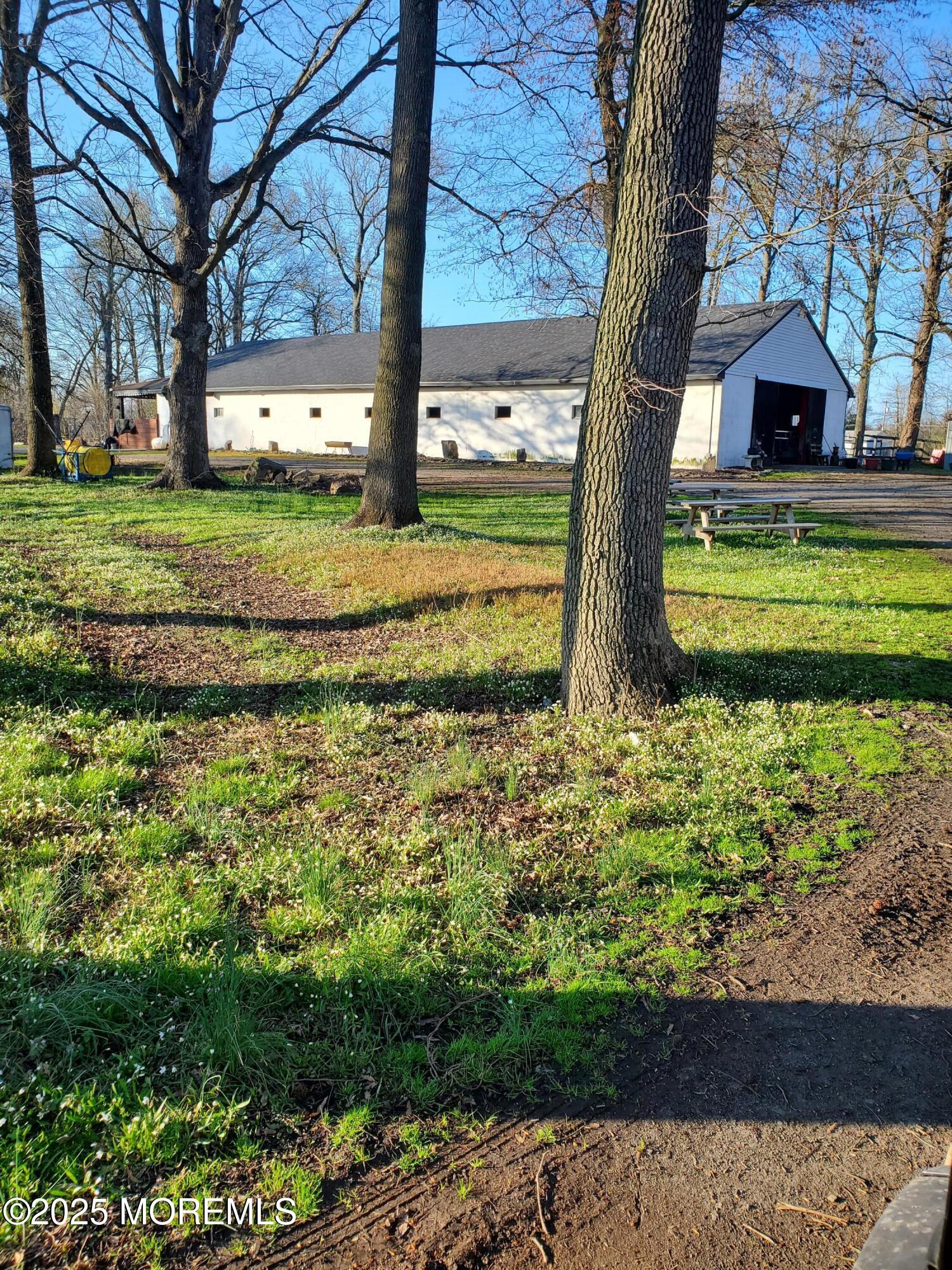 2328 Monmouth Road Jobstown, NJ 08041 - Photo 7 of 54 a view of a garden with an outdoor space