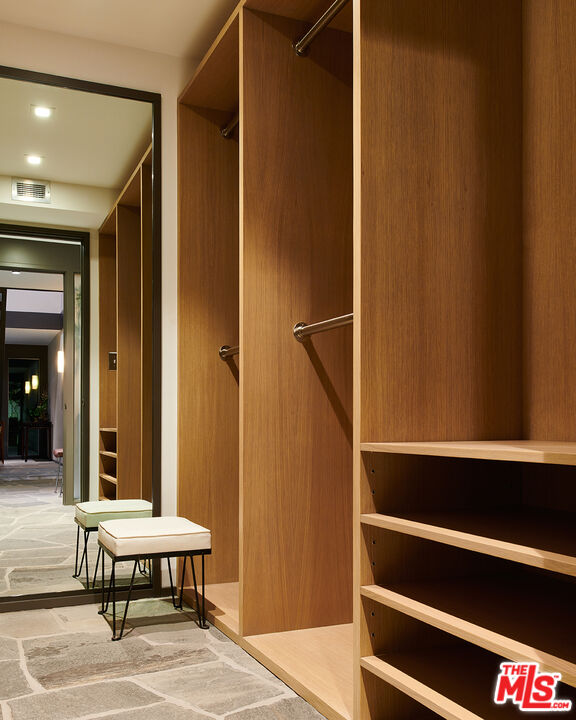 790 Burleigh Drive Pasadena, CA 91105 - Photo 29 of 47 a room with wooden floor and furniture