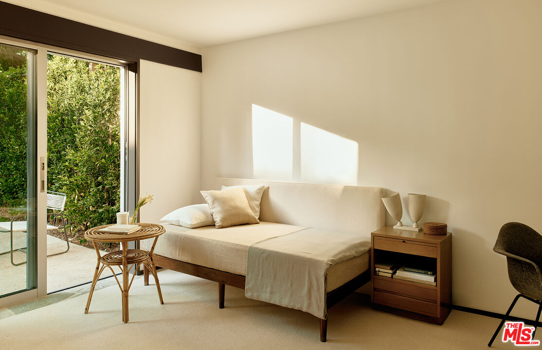 790 Burleigh Drive Pasadena, CA 91105 - Photo 33 of 47 a bedroom with a bed and a window