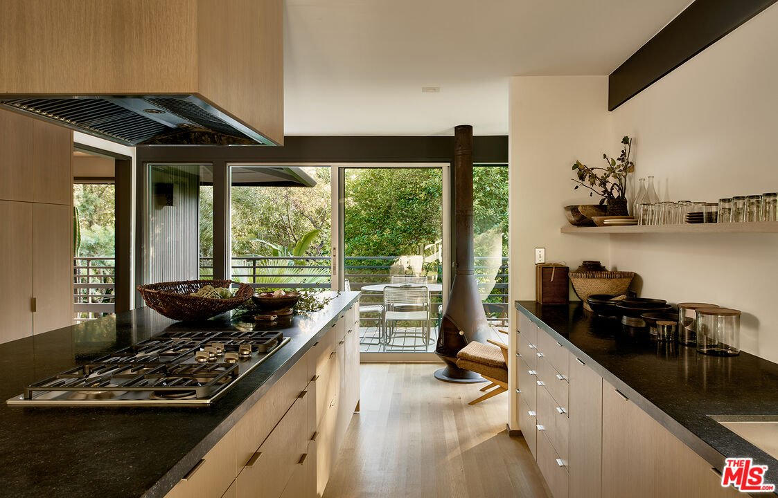 790 Burleigh Drive Pasadena, CA 91105 - Photo 9 of 47 a kitchen with stove and cabinets