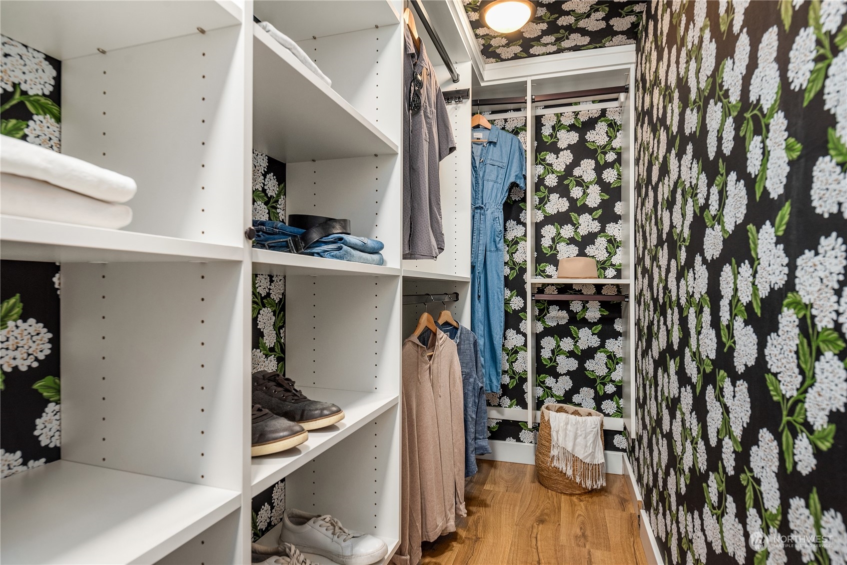8850 30th Avenue Southwest Seattle, WA 98126 - Photo 22 of 39 a view of walk in closet with clothes and shoes