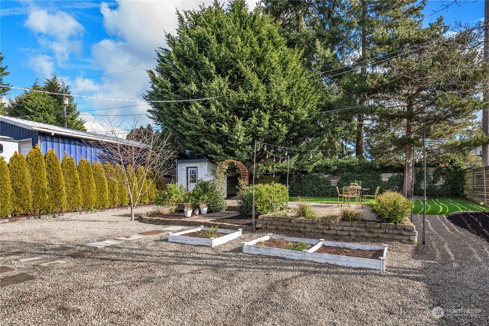 8850 30th Avenue Southwest Seattle, WA 98126 - Photo 28 of 39 a view of backyard with green space