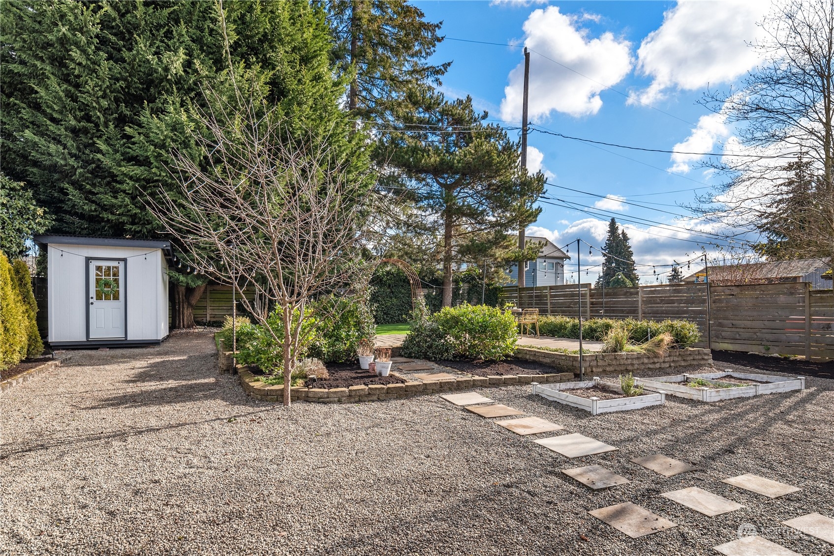 8850 30th Avenue Southwest Seattle, WA 98126 - Photo 29 of 39 a view of a couches in front of a house