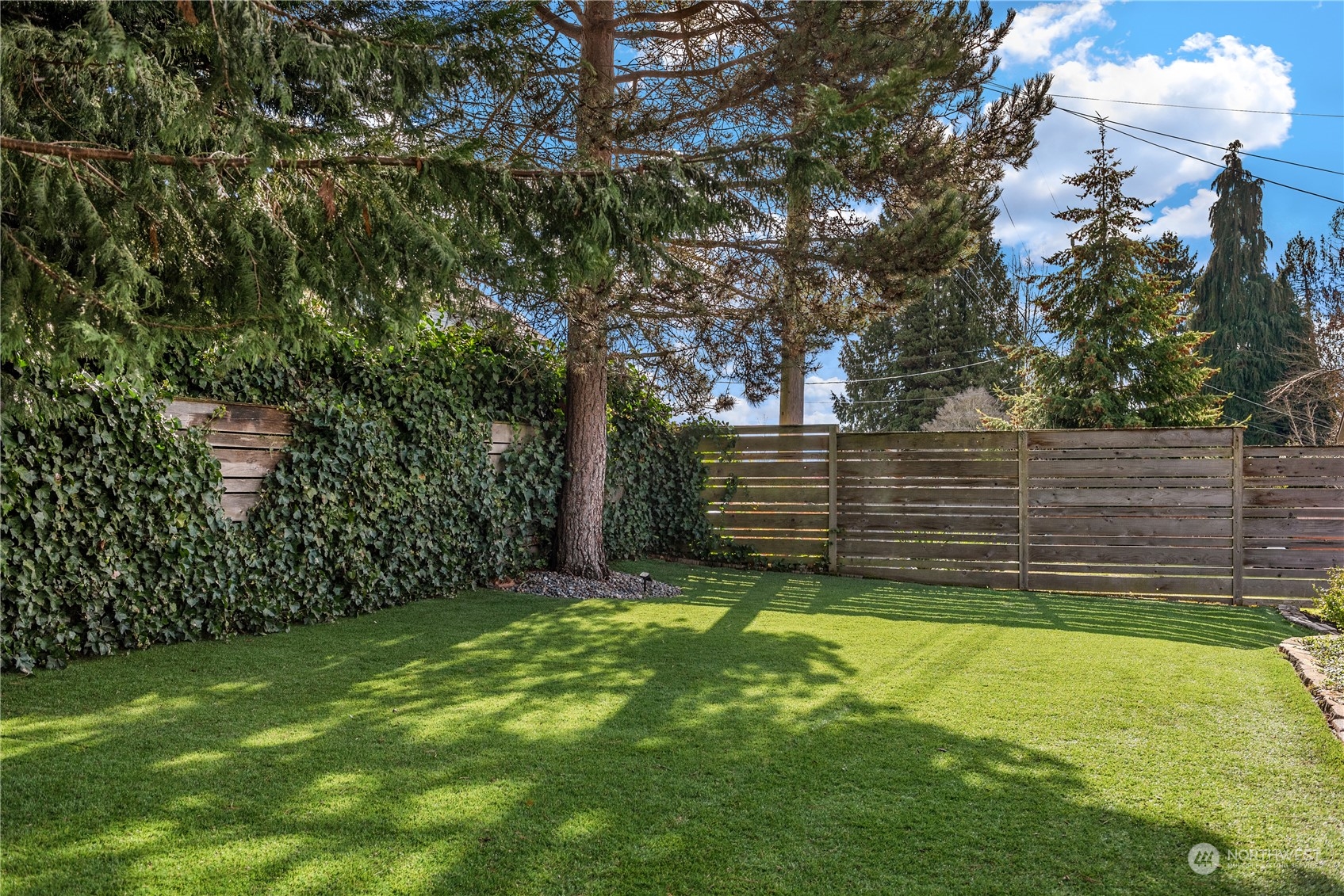 8850 30th Avenue Southwest Seattle, WA 98126 - Photo 32 of 39 a view of a backyard