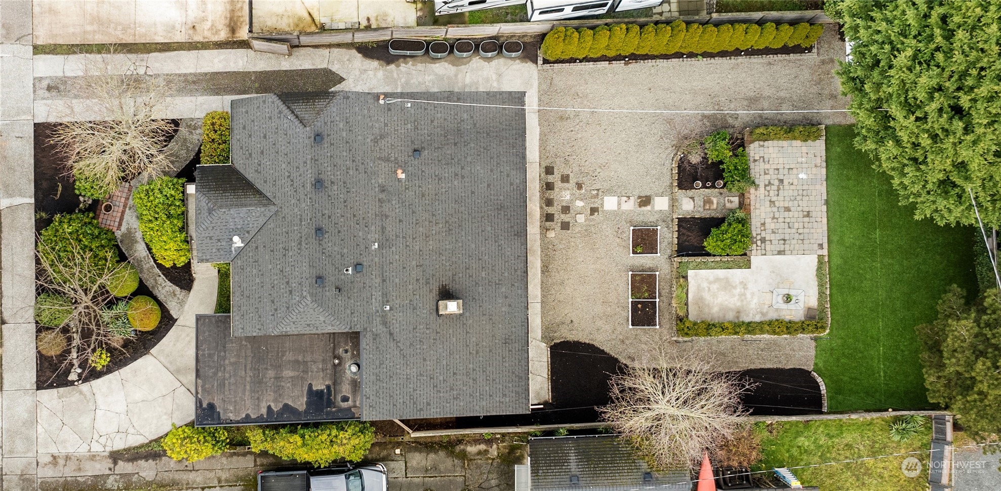 8850 30th Avenue Southwest Seattle, WA 98126 - Photo 38 of 39 an aerial view of a house with a swimming pool