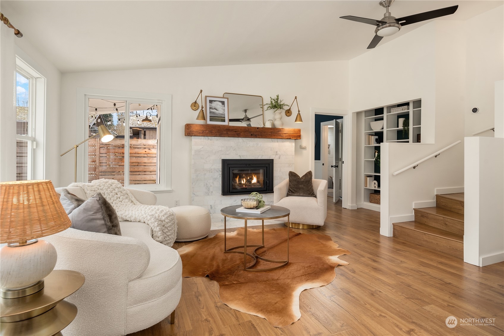 8850 30th Avenue Southwest Seattle, WA 98126 - Photo 5 of 39 a living room with furniture and a fireplace