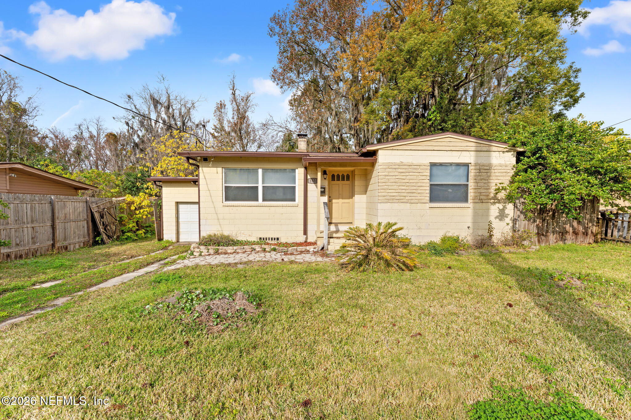 5331 Sharon Terrace Jacksonville, FL 32207 - Photo 1 of 16 a front view of house with yard and trees around