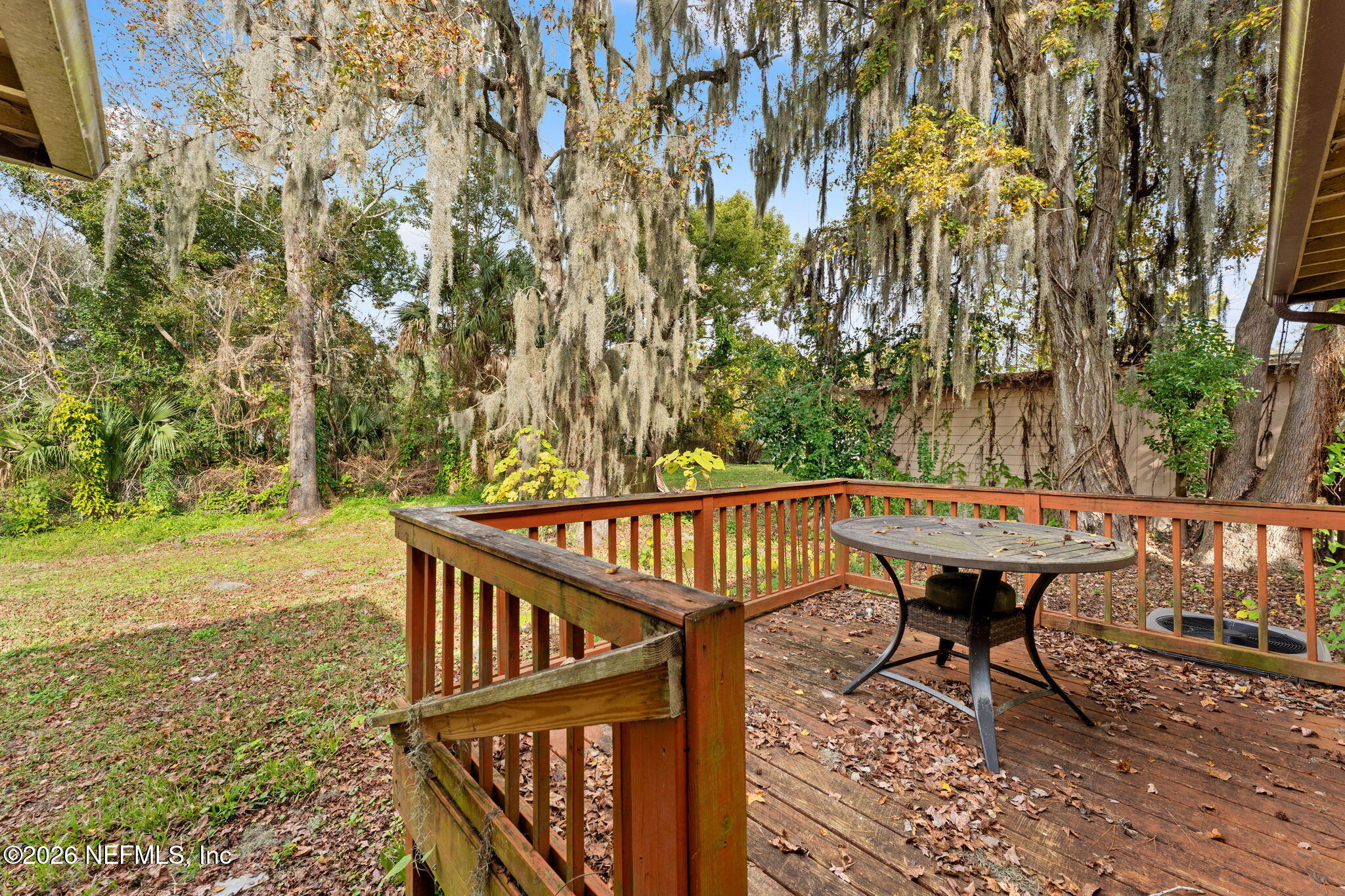 5331 Sharon Terrace Jacksonville, FL 32207 - Photo 13 of 16 a view of balcony with wooden floor and outdoor space
