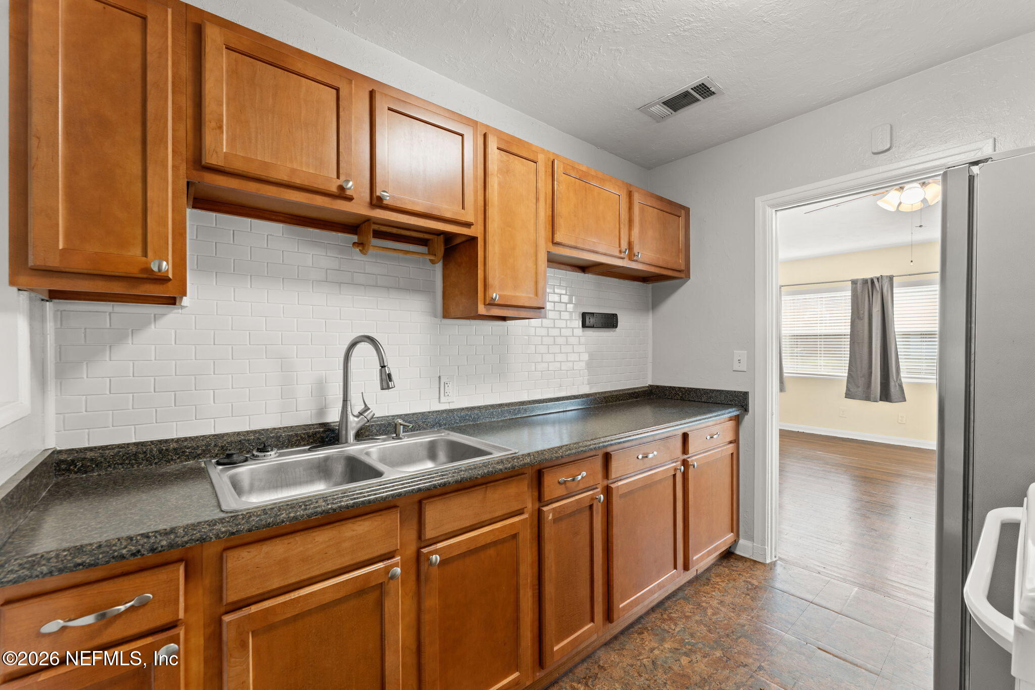5331 Sharon Terrace Jacksonville, FL 32207 - Photo 6 of 16 a kitchen with stainless steel appliances granite countertop a sink a stove and cabinets