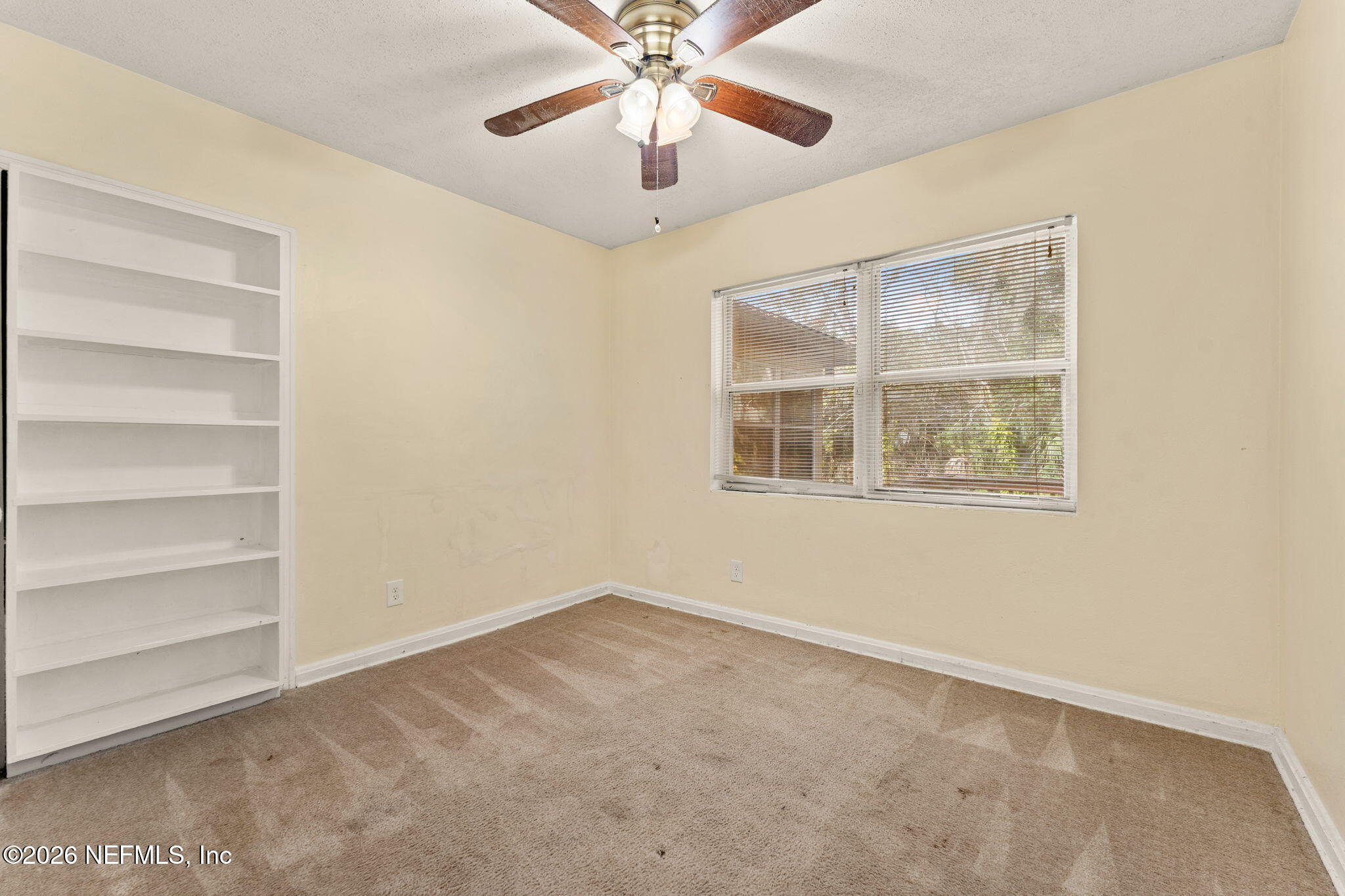5331 Sharon Terrace Jacksonville, FL 32207 - Photo 9 of 16 a view of an empty room with a window