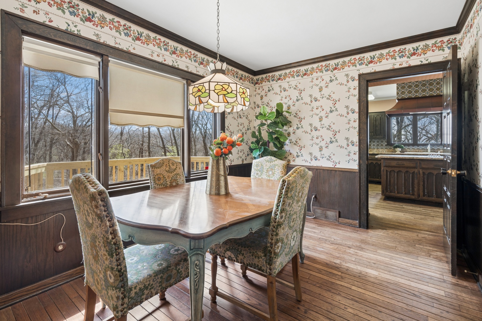 4001 26th Street Rock Island, IL 61201 - Photo 35 of 94 a view of a dining room with furniture window and wooden floor