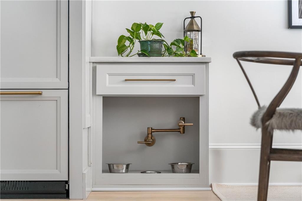 7160 Bennett Road Cumming, GA 30041 - Photo 15 of 83 a bathroom with a sink and a mirror