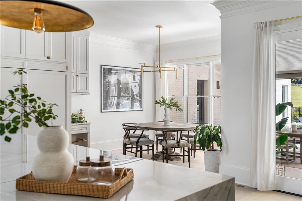 7160 Bennett Road Cumming, GA 30041 - Photo 16 of 83 a living room with furniture and potted plants