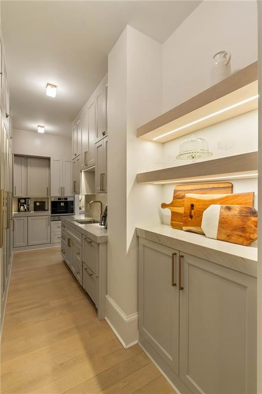 7160 Bennett Road Cumming, GA 30041 - Photo 24 of 83 a kitchen with stainless steel appliances granite countertop a sink and cabinets