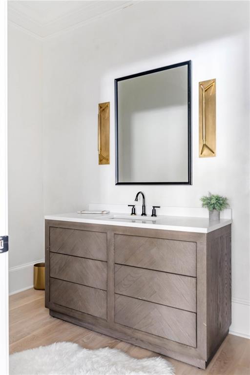 7160 Bennett Road Cumming, GA 30041 - Photo 30 of 83 a bathroom with a sink and a mirror