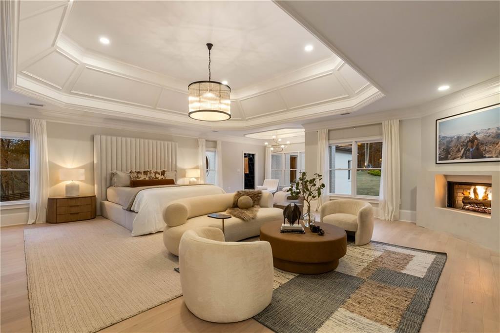 7160 Bennett Road Cumming, GA 30041 - Photo 35 of 83 a living room with furniture and a chandelier