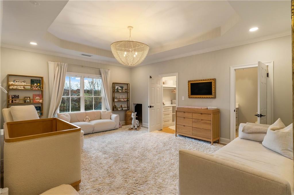 7160 Bennett Road Cumming, GA 30041 - Photo 42 of 83 a room with furniture and a flat screen tv