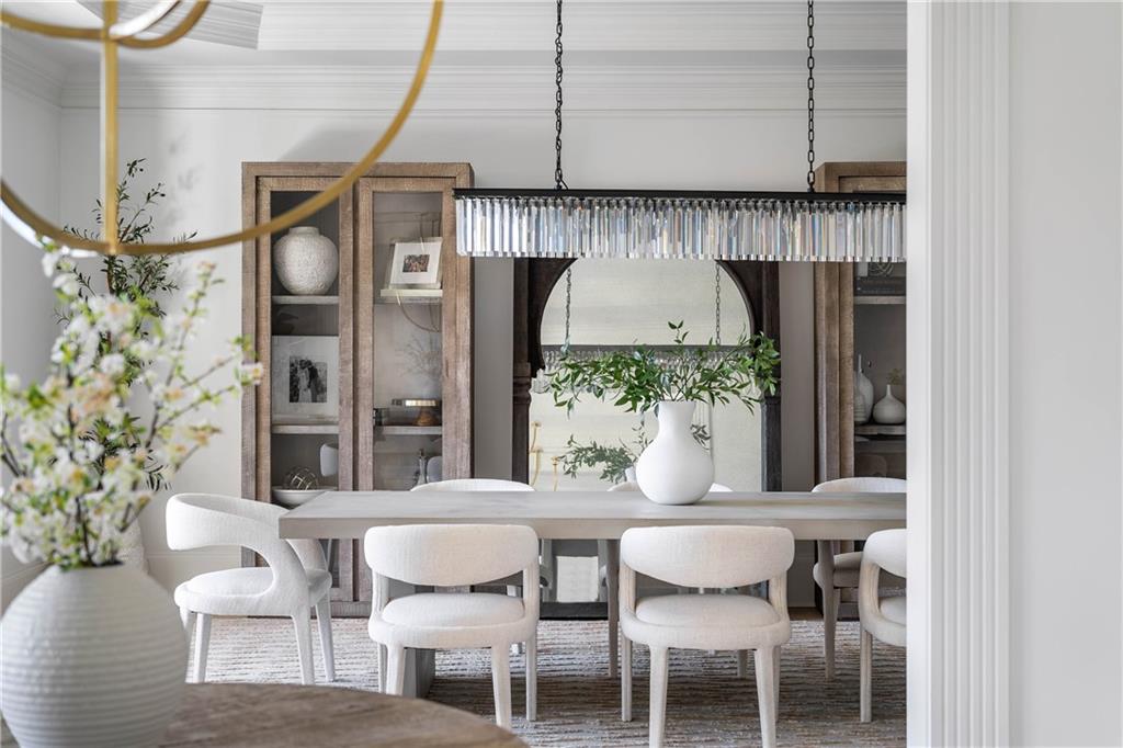 7160 Bennett Road Cumming, GA 30041 - Photo 5 of 83 a dining room with furniture and a chandelier