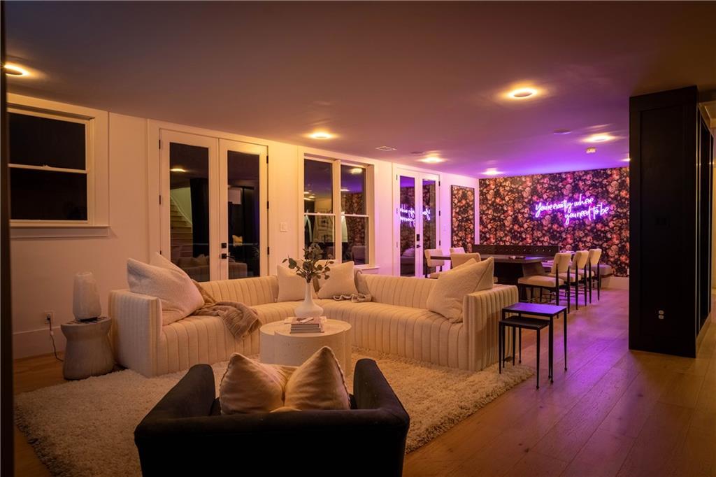 7160 Bennett Road Cumming, GA 30041 - Photo 58 of 83 a living room with furniture and a flat screen tv