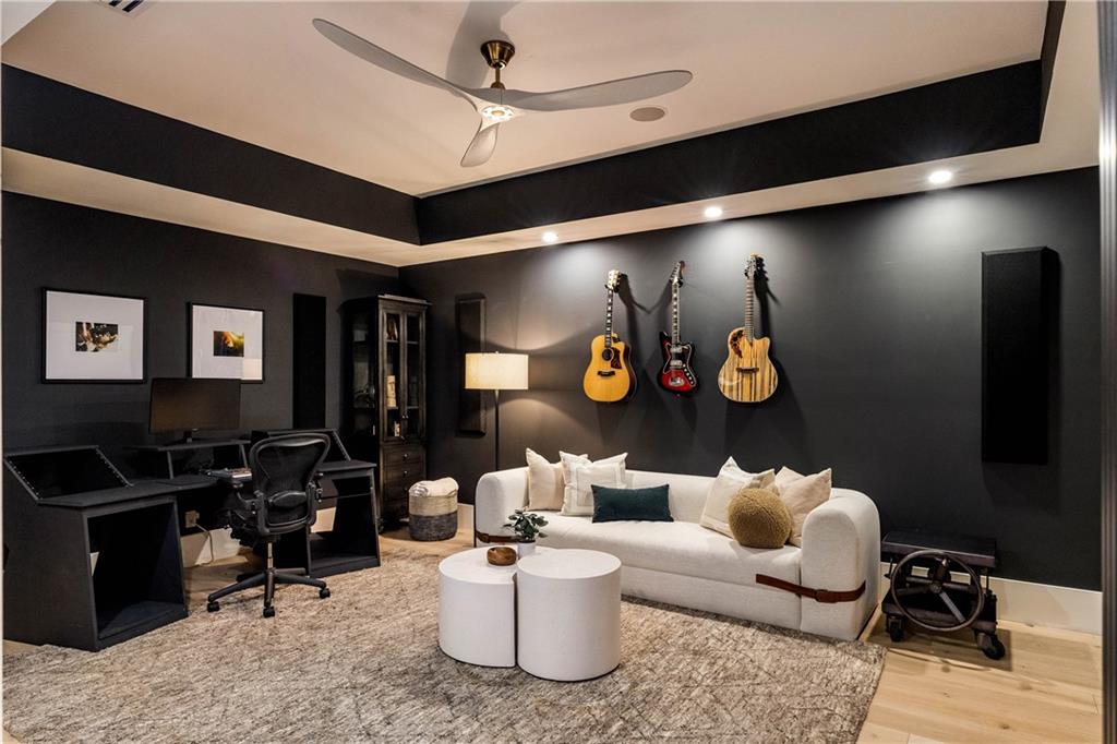 7160 Bennett Road Cumming, GA 30041 - Photo 63 of 83 a living room with furniture and a flat screen tv