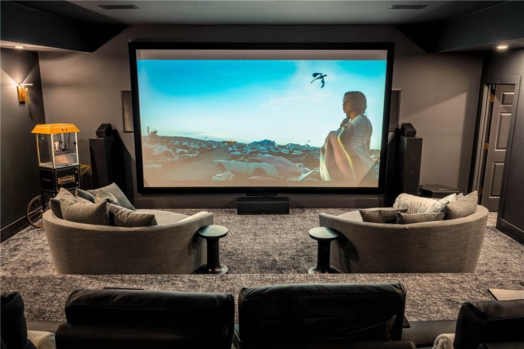 7160 Bennett Road Cumming, GA 30041 - Photo 64 of 83 a living room with furniture and a flat screen tv