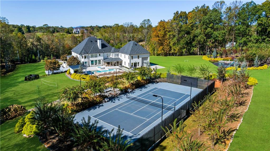 7160 Bennett Road Cumming, GA 30041 - Photo 78 of 83 aerial view of a house with a garden