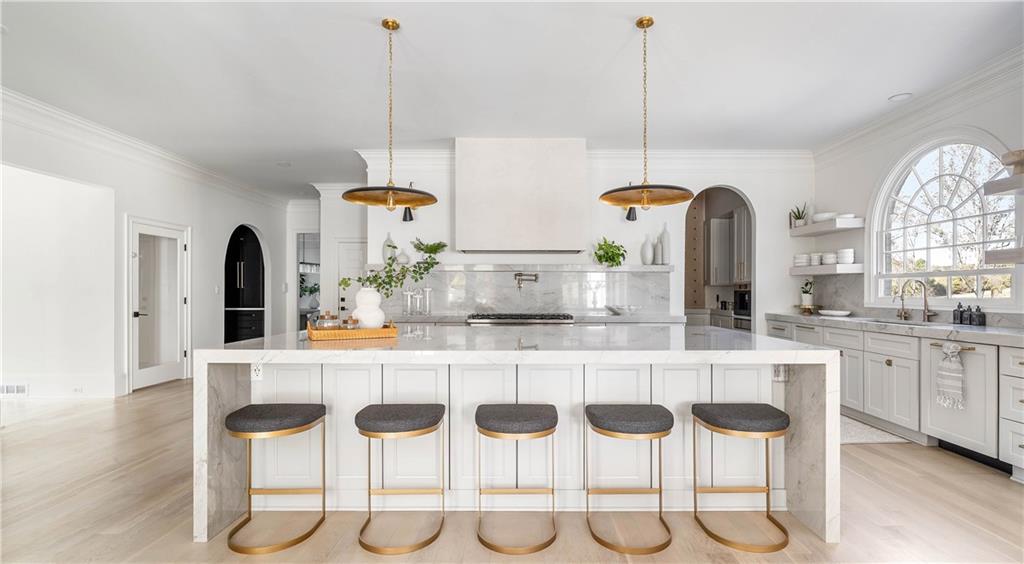 7160 Bennett Road Cumming, GA 30041 - Photo 9 of 83 a kitchen with granite countertop cabinets and white appliances