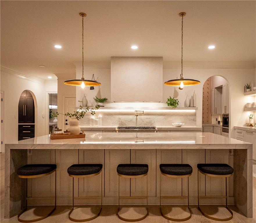 7160 Bennett Road Cumming, GA 30041 - Photo 10 of 83 a kitchen with a sink and chairs