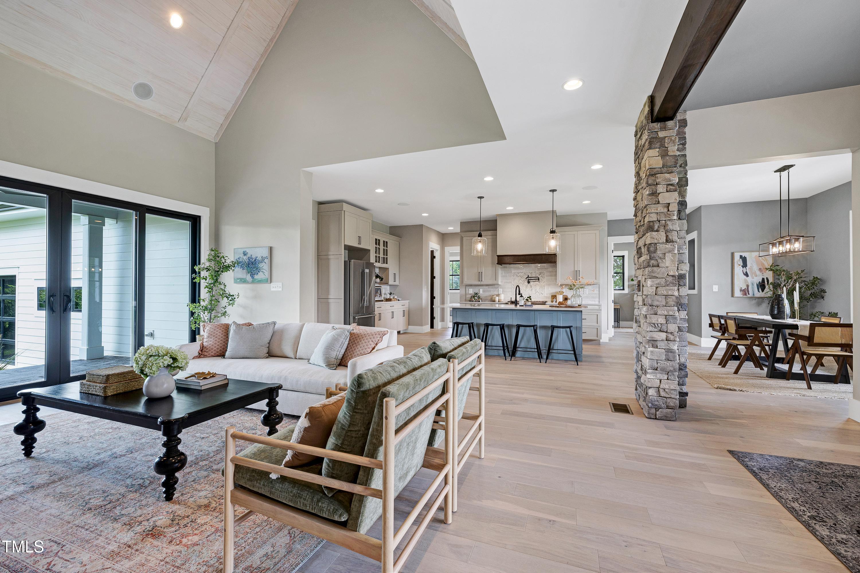 6509 Zebulon Road Wake Forest, NC 27587 - Photo 25 of 100 a living room with fireplace furniture and a large window