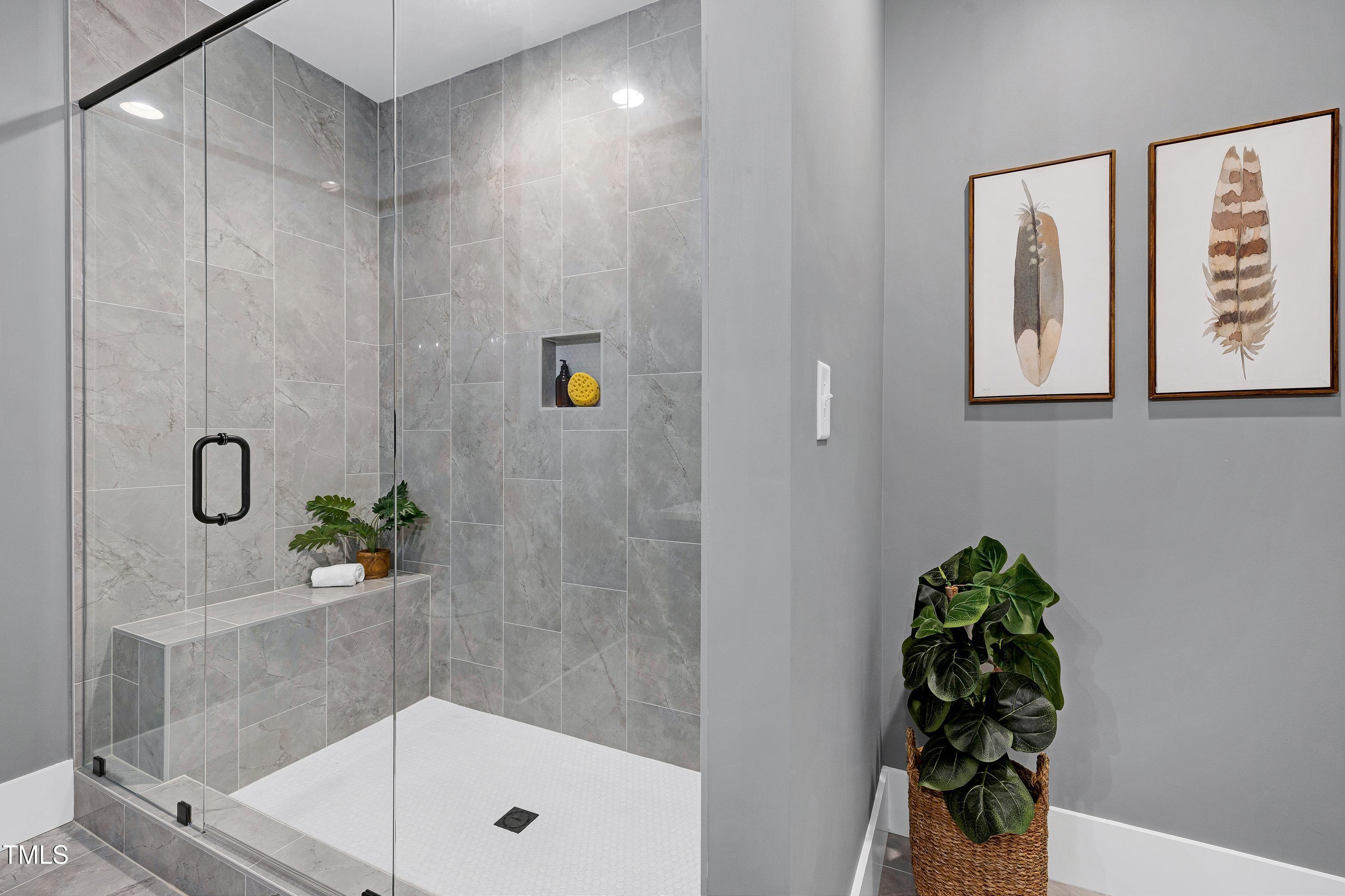 6509 Zebulon Road Wake Forest, NC 27587 - Photo 37 of 100 a bathroom with a shower