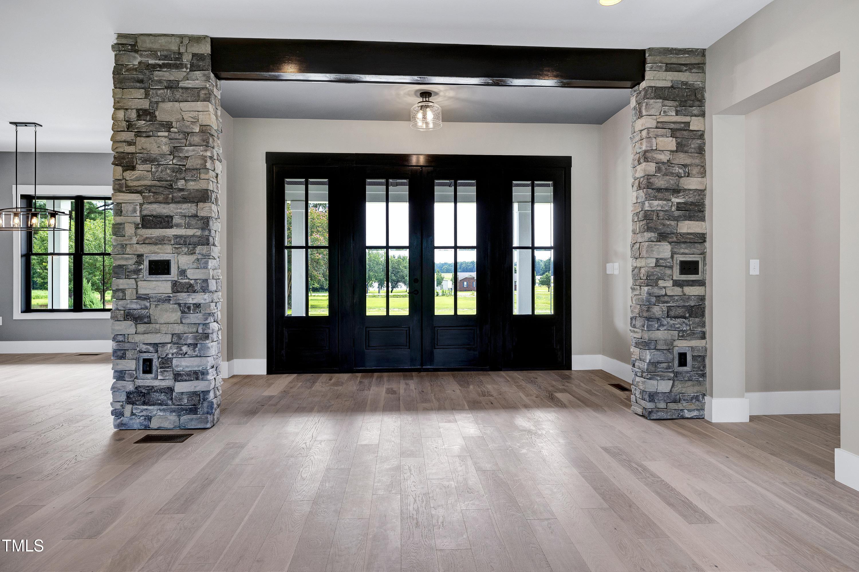 6509 Zebulon Road Wake Forest, NC 27587 - Photo 48 of 100 wooden floor in an empty room with a window