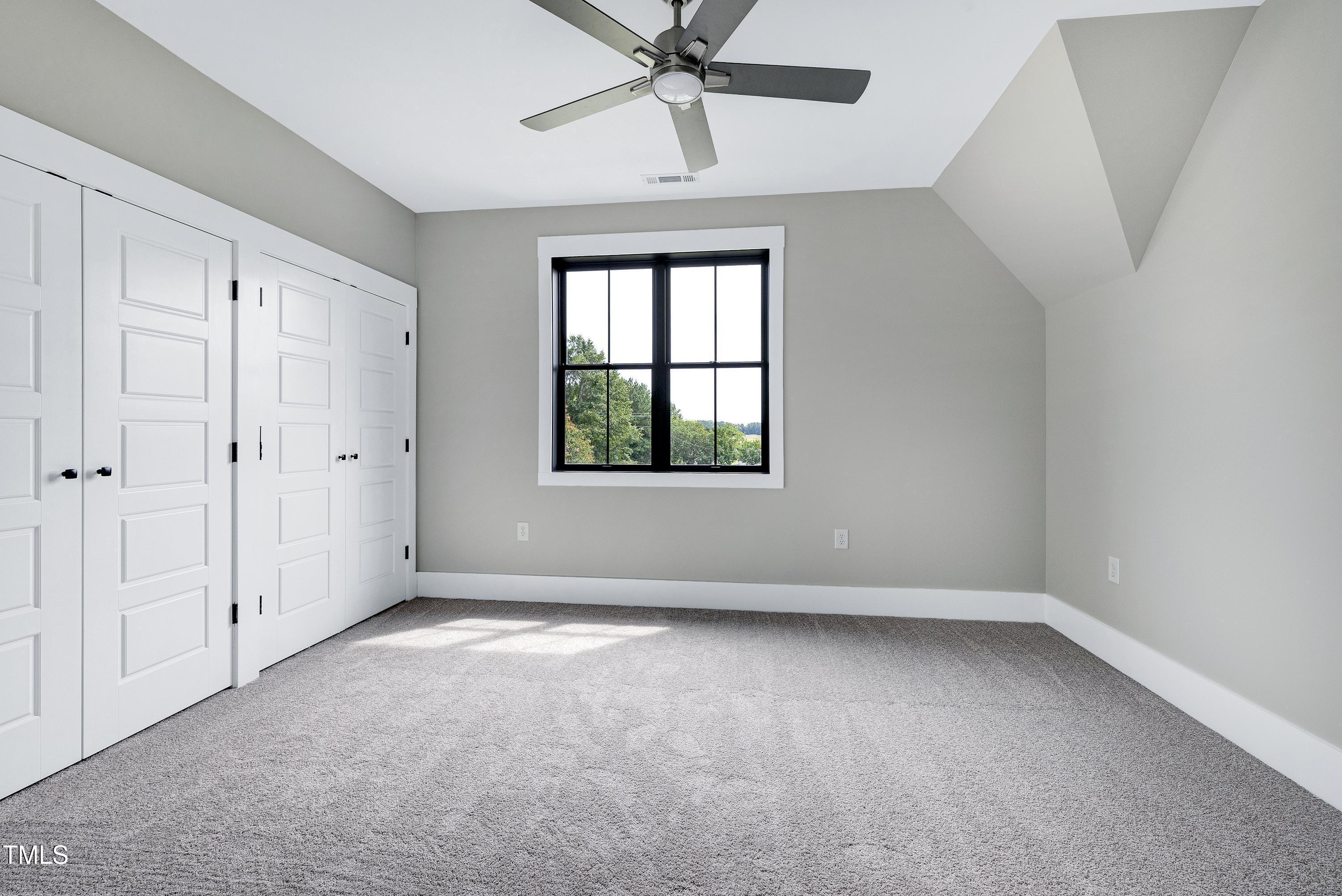 6509 Zebulon Road Wake Forest, NC 27587 - Photo 71 of 100 a view of an empty room with a window