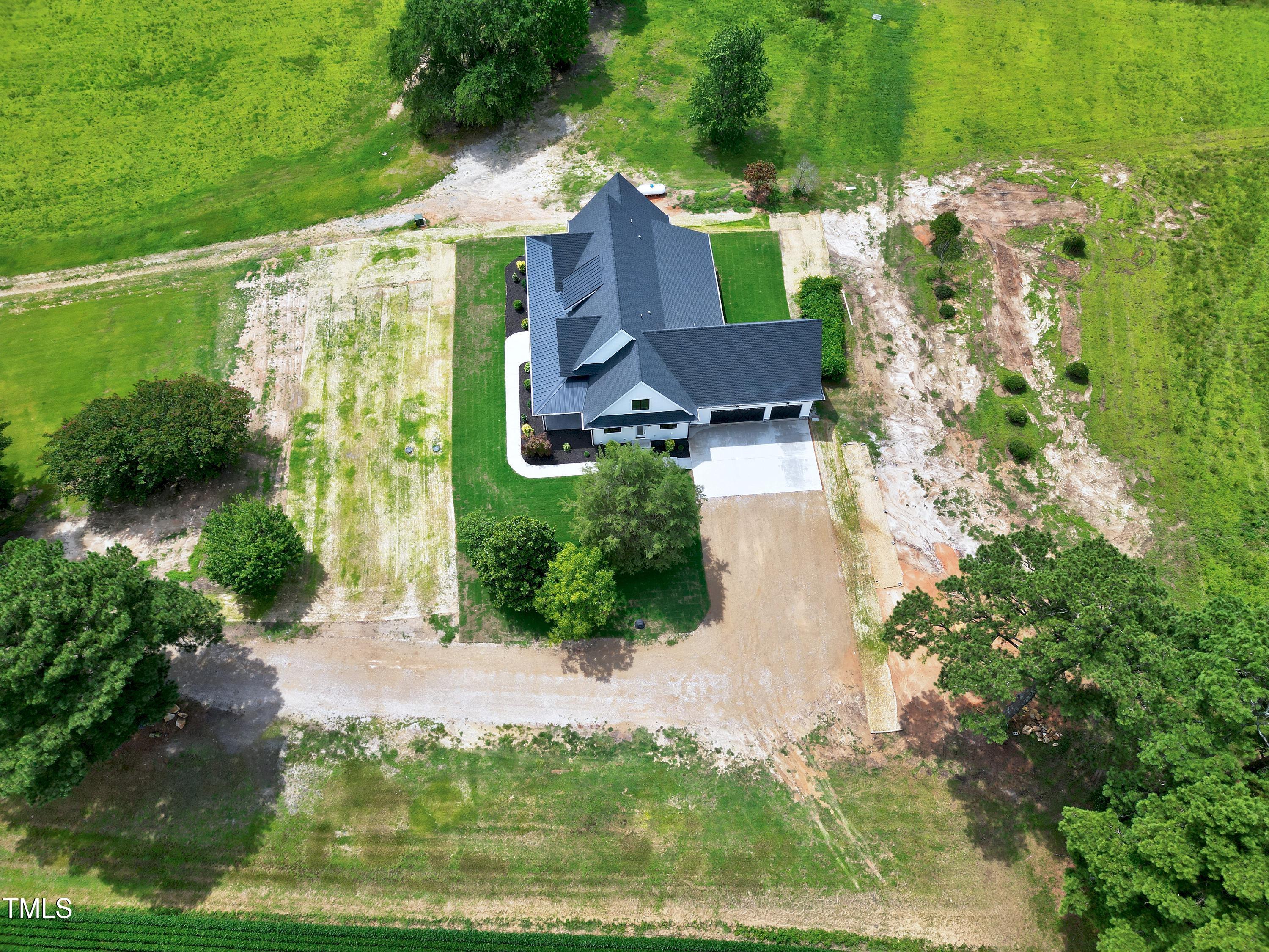6509 Zebulon Road Wake Forest, NC 27587 - Photo 91 of 100 an aerial view of a house with a yard basket ball court and outdoor seating